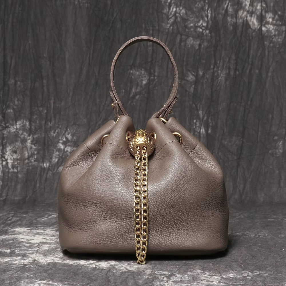 Stylish LUOKIR Genuine Leather Bucket Bag - Versatile Metal Drawstring Crossbody Handbag for Women