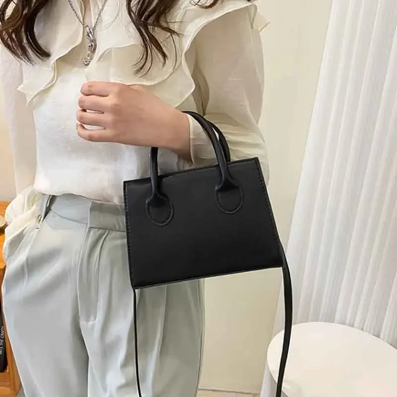 Chic Minimalist Black Square Bag - Versatile Top Handle & Crossbody Handbag for Work and Everyday Elegance