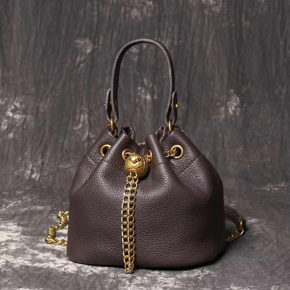 Stylish LUOKIR Genuine Leather Bucket Bag - Versatile Metal Drawstring Crossbody Handbag for Women