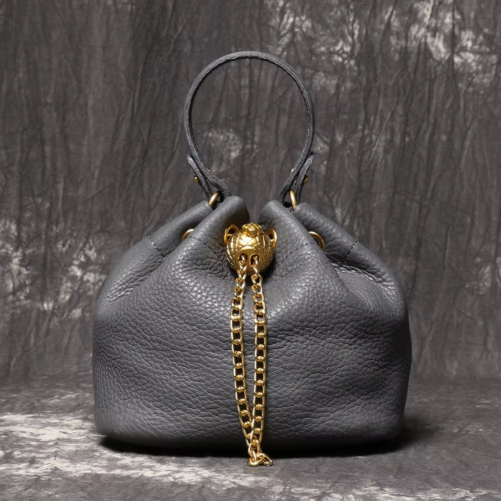 Stylish LUOKIR Genuine Leather Bucket Bag - Versatile Metal Drawstring Crossbody Handbag for Women