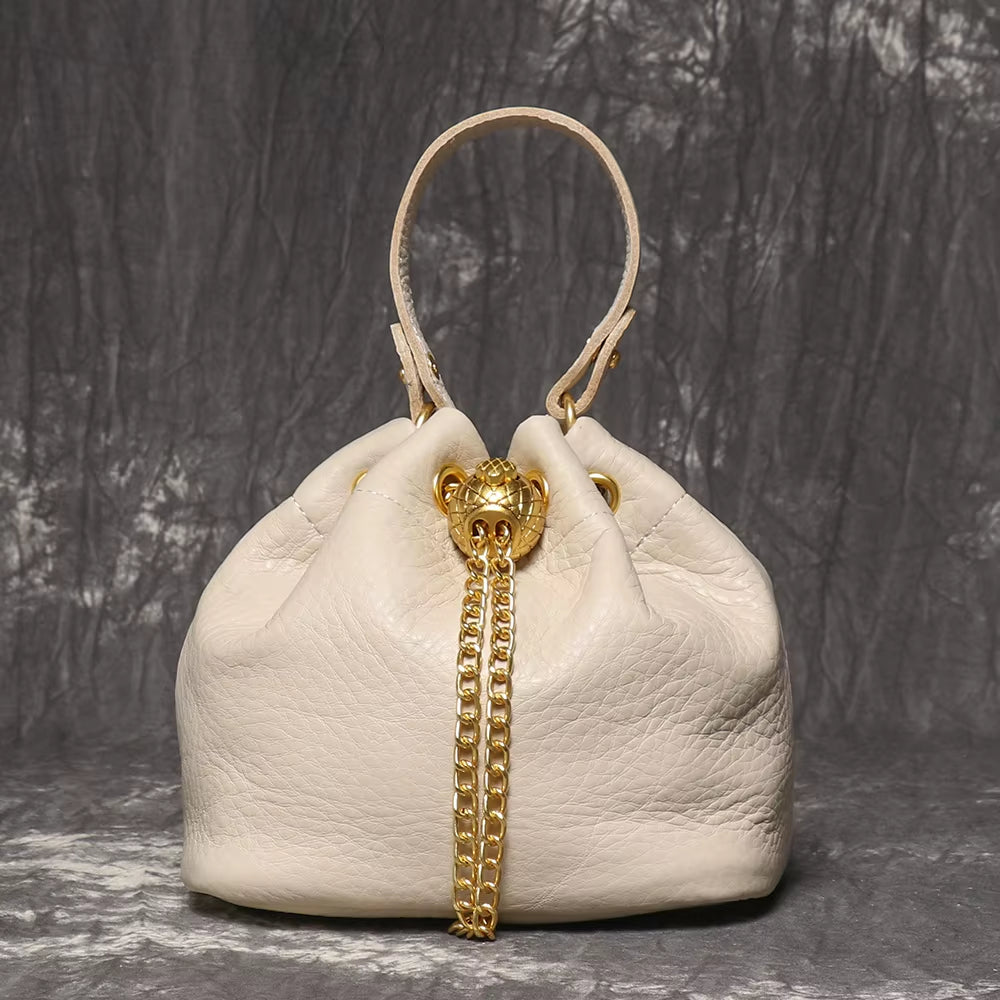 Stylish LUOKIR Genuine Leather Bucket Bag - Versatile Metal Drawstring Crossbody Handbag for Women